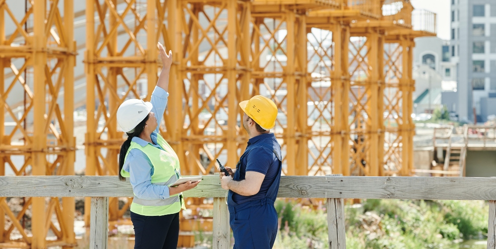two women looking at building structure